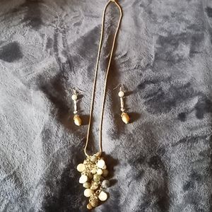Dangling faux pearl earrings & statement necklace